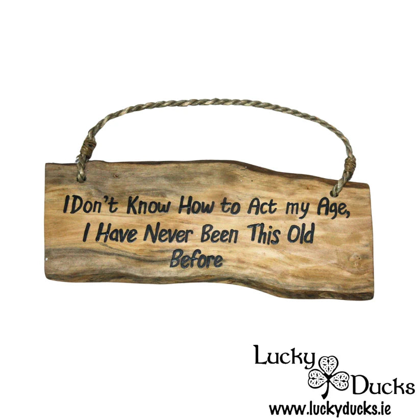 Act your age Wooden Plaque